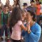 A small girl was snapped pulling Tiger Shroff's cheeks at T-Series Music Video Shoot