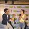 Jackky Bhagnani giving Lauren Gottlieb a bouquet of flowers at the Promotions of Welcome To Karachi