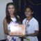 Amy Jackson gives away award to the student at the Promotions of Singh is Bling at Jaihind College