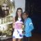 Amy Jackson gives away the award to a student at the Promotions of Singh is Bling at Jaihind College