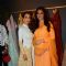 Malaika Arora Khan and Tabu pose for the media at the Launch of Mayyur Girotra Store in Dubai