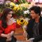 Shah Rukh Khan offers Sunflowers to the Beautiful Kajol - A Still from Dilwale