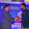 Rishi Kapoor presents an award to Sandip Soparrkar for inspiring the youth