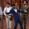 Shah Rukh Khan strikes his signature pose during the Promotions of 'Fan' on 'Comedy Nights Bachao!