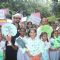 Ajaz Khan poses with children at 'Van Mahotsav Week'