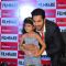 Varun Dhawan posing for click with fan at launch of Filmfare cover