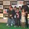 Bollywood actor Amitabh Bachchan with kids at the premiere of film "Paa"
