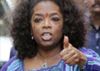 Oprah's guards scuffle with cameramen