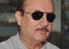 Anupam poses as blind man, says it's a marketing gimmick