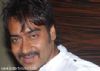 Ajay gifts gold chain to fan