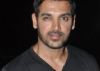 Roping in real footballers for '1911' will be great: John Abraham