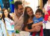 Esha's Baby is a BUNDLE of CUTENESS: Is all SMILES posing with Mom-Dad